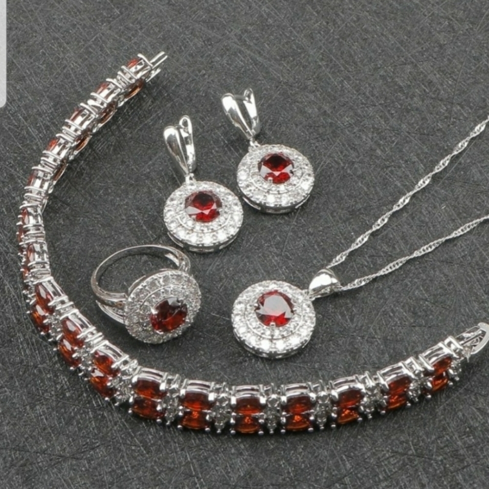 Sterling silver set with red simulated sapphire